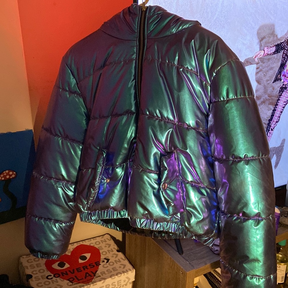 This jacket is from forever 21 it’s a  womens size larger it’s blue & purple